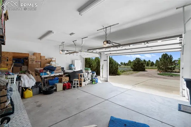 a view of a garage with storage