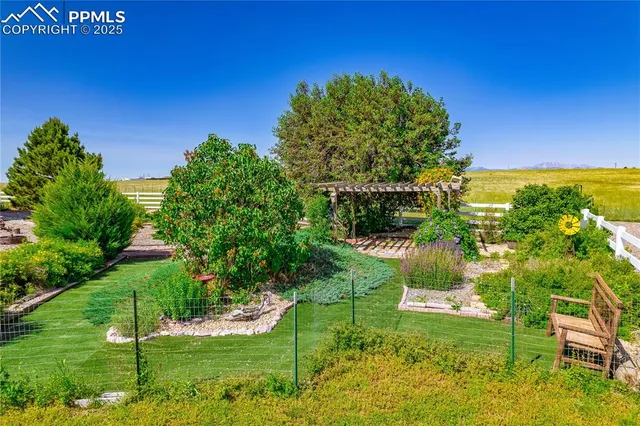 a view of a backyard with patio