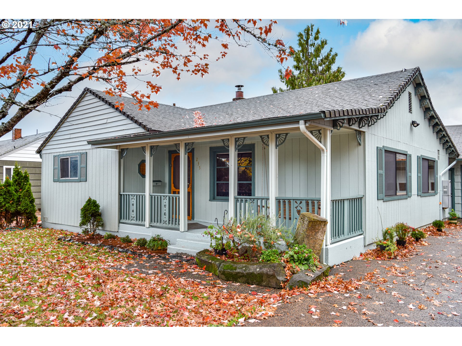 235 North 24th Street Springfield, OR 97477 - Photo 1 of 24 a front view of a house with a porch