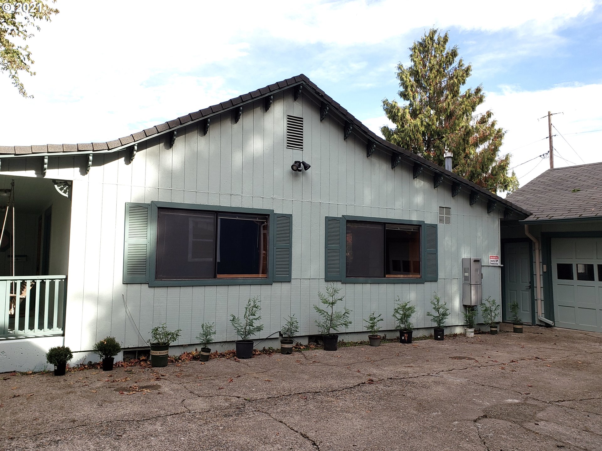 235 North 24th Street Springfield, OR 97477 - Photo 12 of 24 a front view of a house with garage