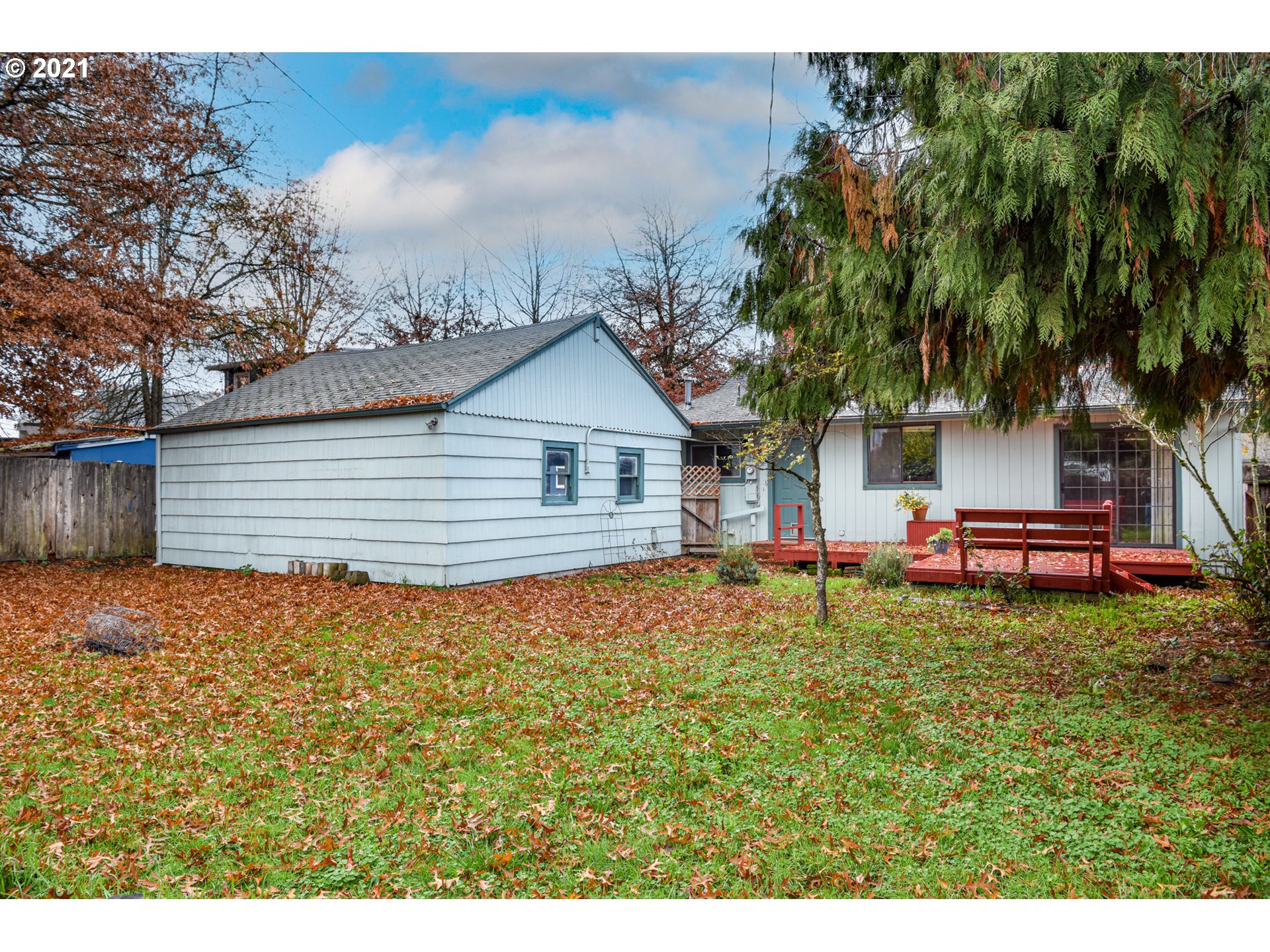 235 North 24th Street Springfield, OR 97477 - Photo 22 of 24 a backyard of a house with table and chairs