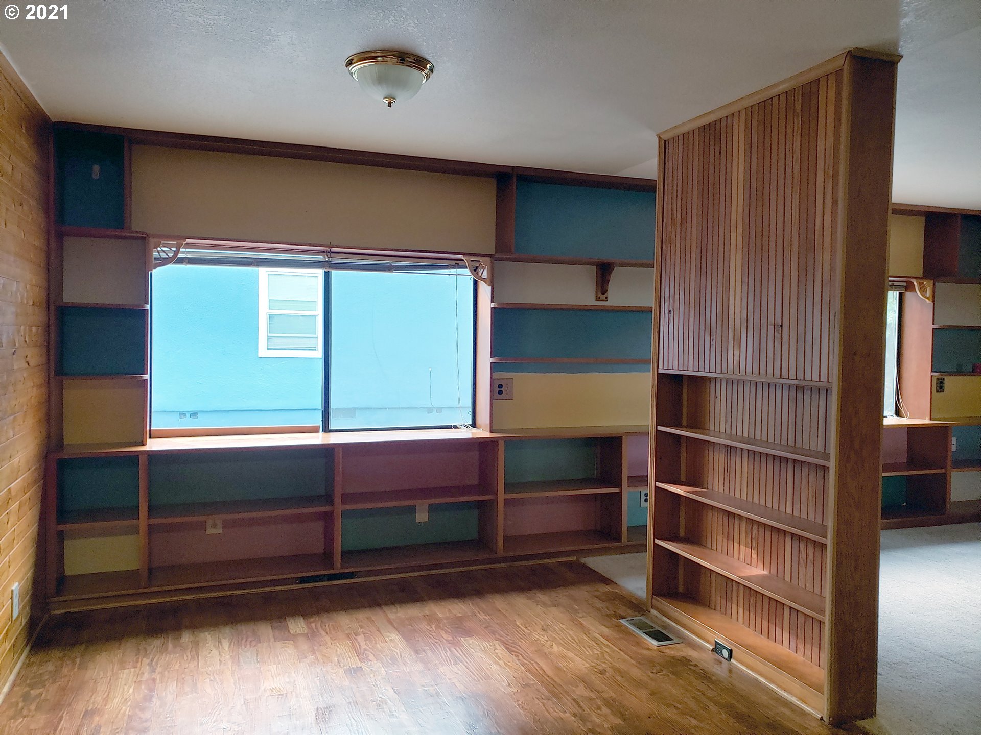 235 North 24th Street Springfield, OR 97477 - Photo 4 of 24 a view of walk in closet with empty racks