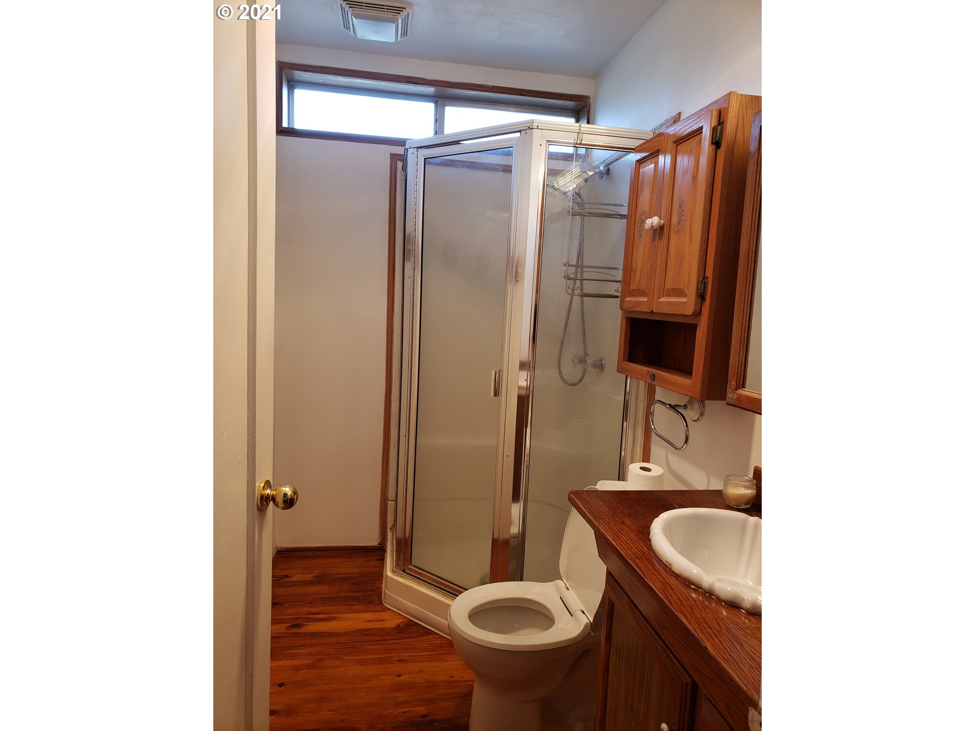 235 North 24th Street Springfield, OR 97477 - Photo 7 of 24 a bathroom with a sink and a toilet
