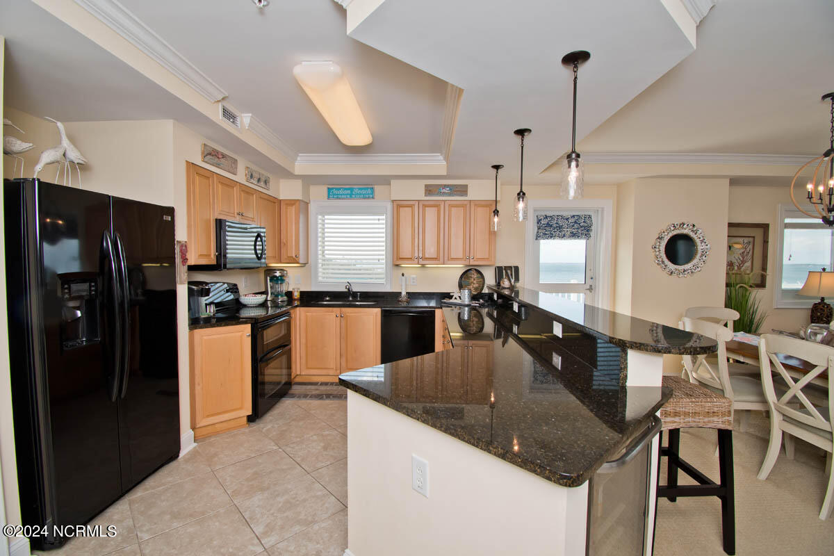 1550 Salter Path Road, Unit 301 Indian Beach, NC 28512 - Photo 17 of 63 Kitchen and Dining (1)