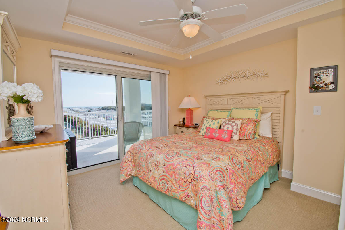 1550 Salter Path Road, Unit 301 Indian Beach, NC 28512 - Photo 29 of 63 2nd bedroom and deck access view