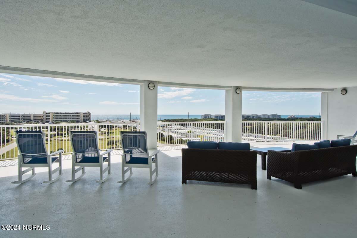 1550 Salter Path Road, Unit 301 Indian Beach, NC 28512 - Photo 45 of 63 Each floor has it's own sitting area with ocean breeze and views.