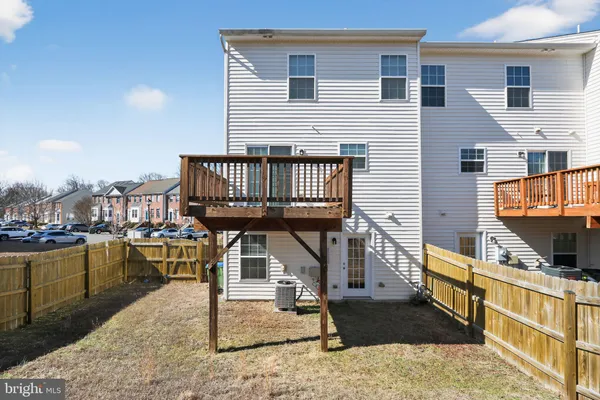 a view of a backyard of the house