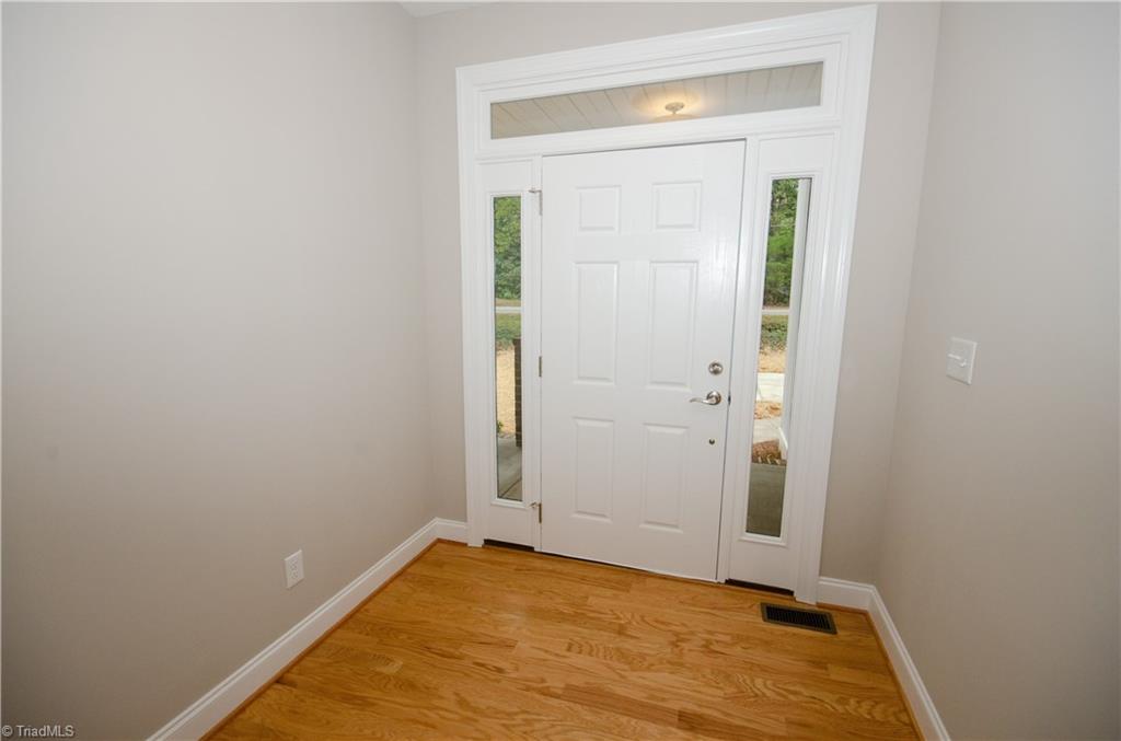 3589 Transou Road Pfafftown, NC 27040 - Photo 2 of 29 Front Entry. 1st Floor has Hardwood Floors