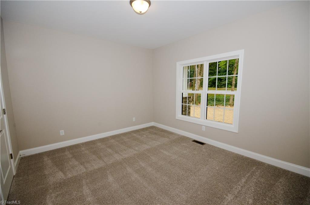 3589 Transou Road Pfafftown, NC 27040 - Photo 15 of 29 1st Floor Second Bedroom