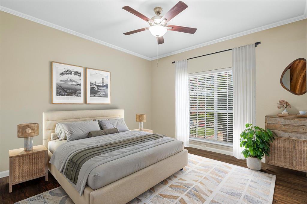 8601 Park Lane, Unit 221 Dallas, TX 75231 - Photo 18 of 26 Bedroom featuring crown molding, dark wood-style flooring, and ceiling fan