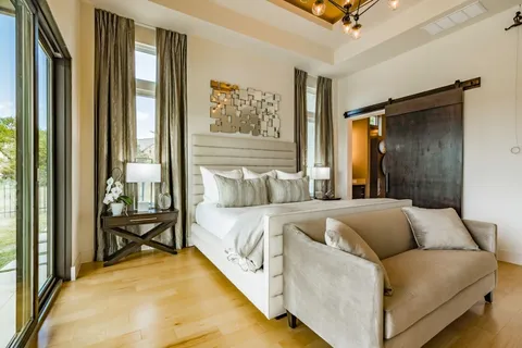 a bed room with a bed and a couch