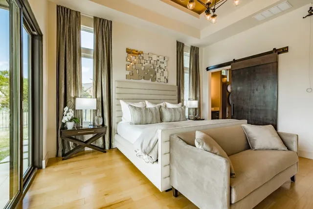 a bed room with a bed and a couch