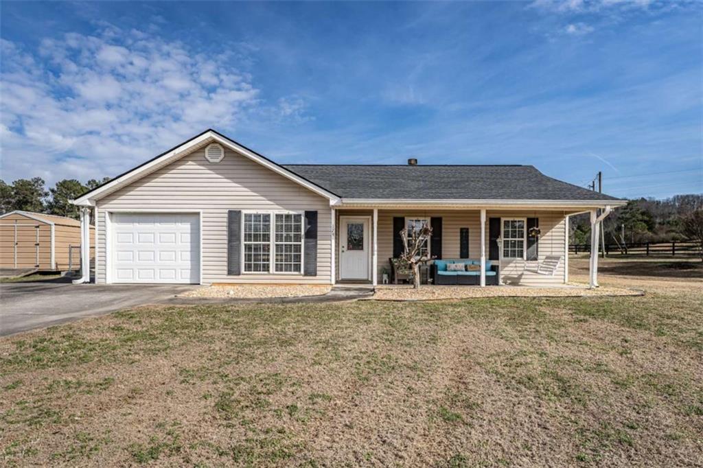 front view of a house with a yard