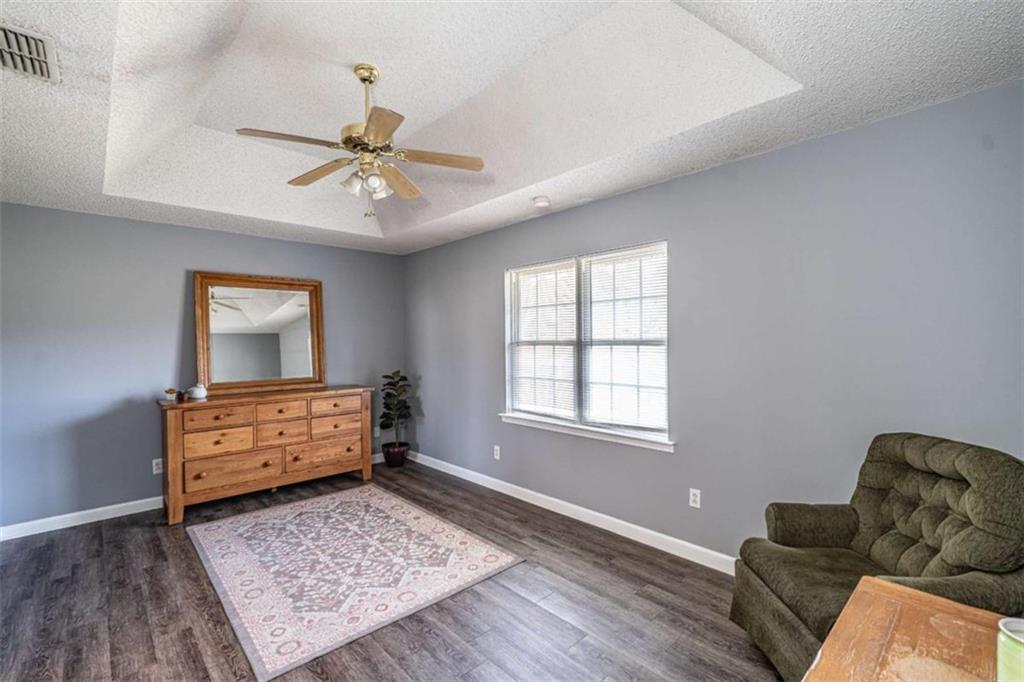 179 Couey Circle Northeast Rome, GA 30161 - Photo 13 of 37 a living room with furniture and a window