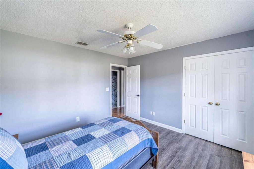 179 Couey Circle Northeast Rome, GA 30161 - Photo 18 of 37 a bedroom with bed and a window
