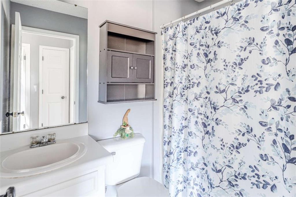 179 Couey Circle Northeast Rome, GA 30161 - Photo 19 of 37 a bathroom with a sink and a mirror