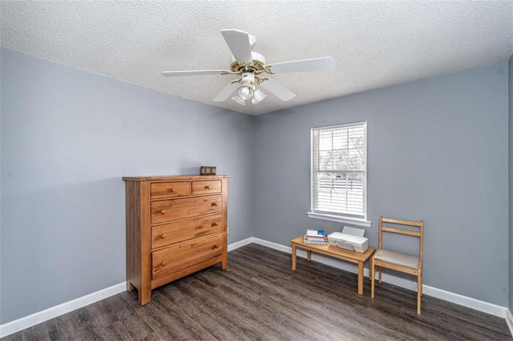 179 Couey Circle Northeast Rome, GA 30161 - Photo 20 of 37 a living room with furniture and a window