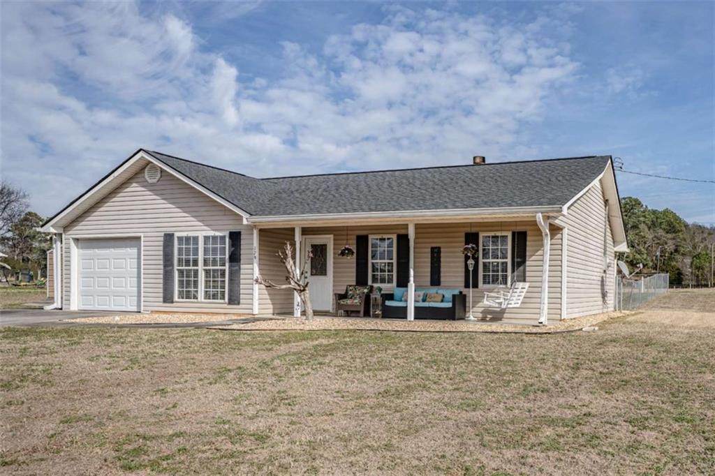 179 Couey Circle Northeast Rome, GA 30161 - Photo 2 of 37 front view of a house with a yard