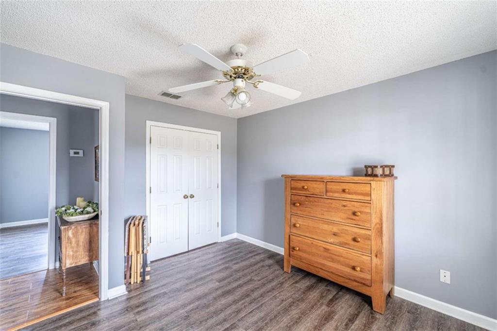 179 Couey Circle Northeast Rome, GA 30161 - Photo 21 of 37 wooden floor in an empty room with a window