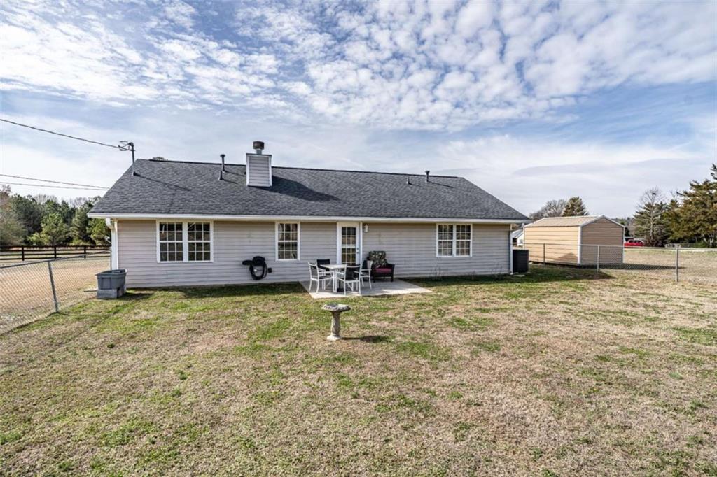 179 Couey Circle Northeast Rome, GA 30161 - Photo 28 of 37 a view of a house with a yard