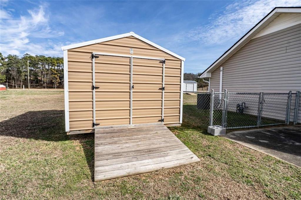 179 Couey Circle Northeast Rome, GA 30161 - Photo 30 of 37 a front view of a house with a yard
