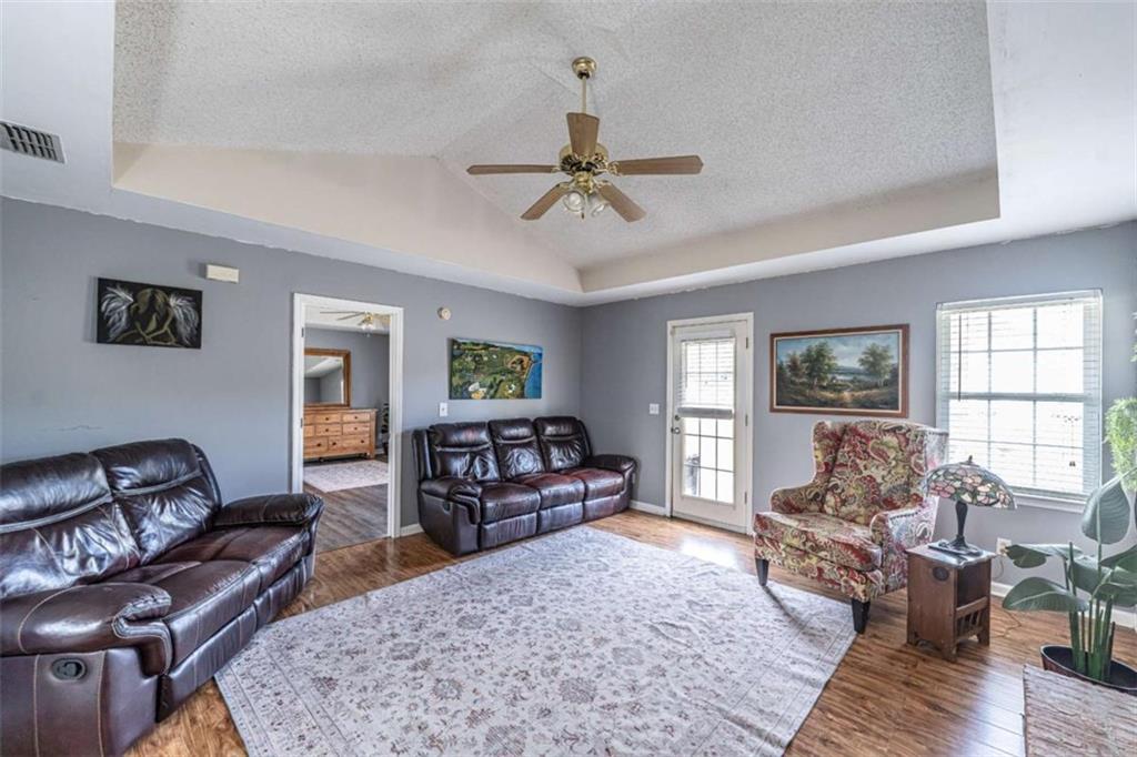 179 Couey Circle Northeast Rome, GA 30161 - Photo 5 of 37 a living room with furniture or couch and a window