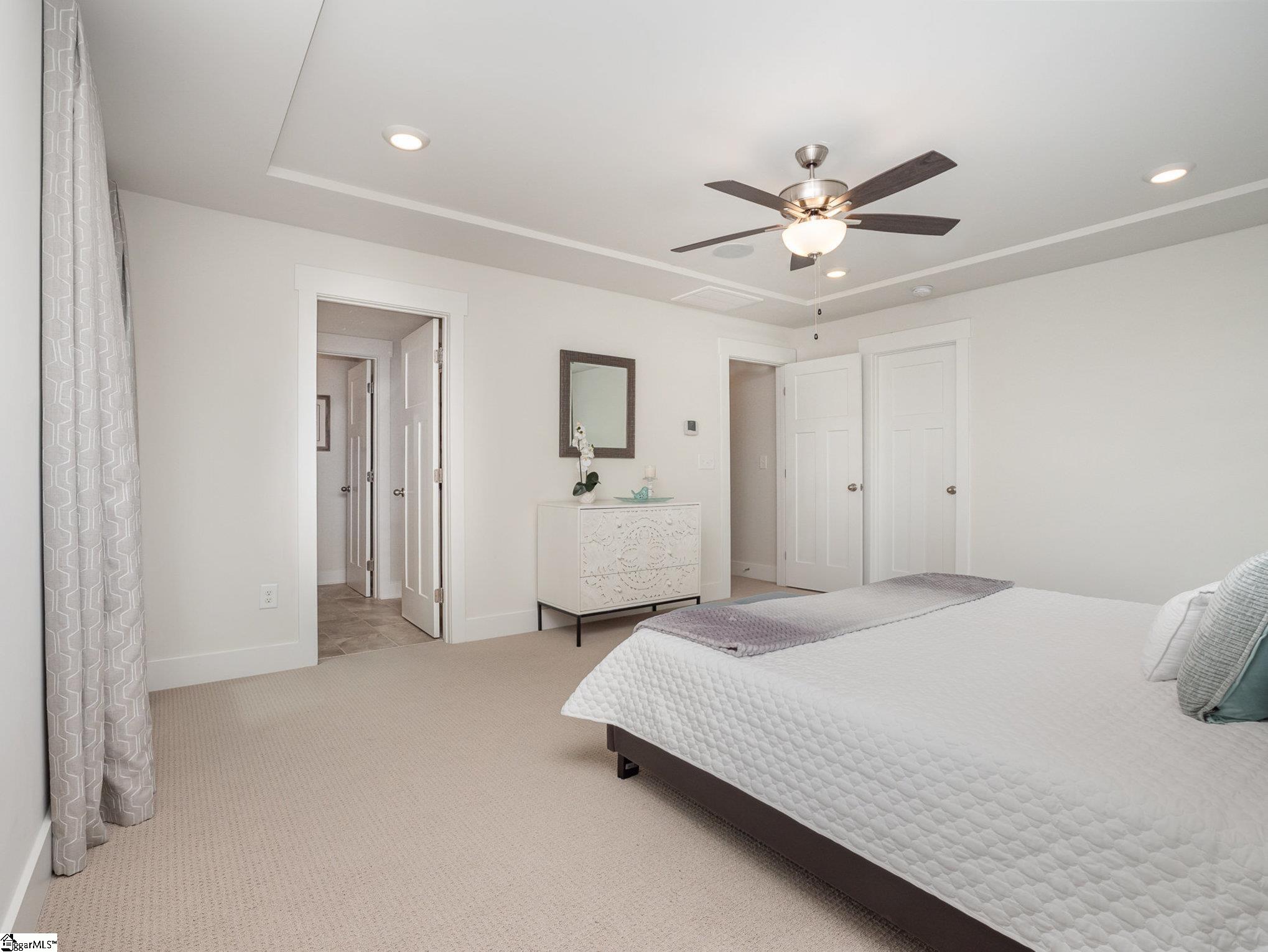 100 Outback Drive Greer, SC 29650 - Photo 14 of 25 The en-suite primary has a private bathroom right in the room.