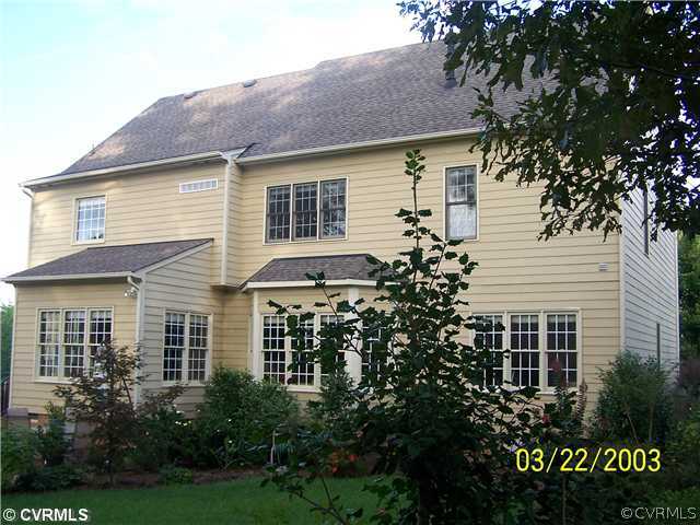 13338 Tipple Point Road Midlothian, VA 23114 - Photo 11 of 12 a front view of a house with garden