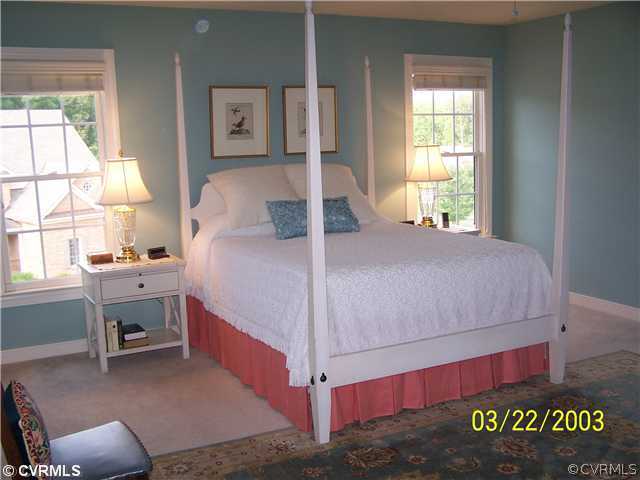 13338 Tipple Point Road Midlothian, VA 23114 - Photo 7 of 12 a bedroom with a bed and a window