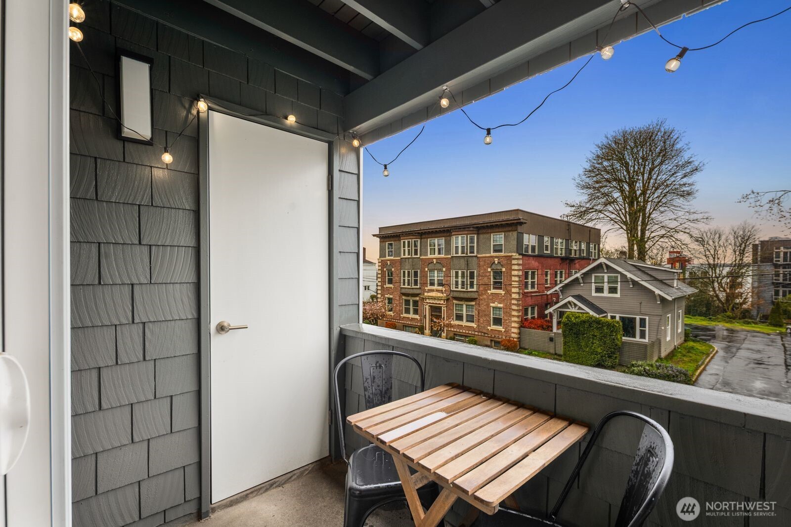 1729 18th Avenue, Unit 201 Seattle, WA 98122 - Photo 26 of 31 a view of a balcony with furniture