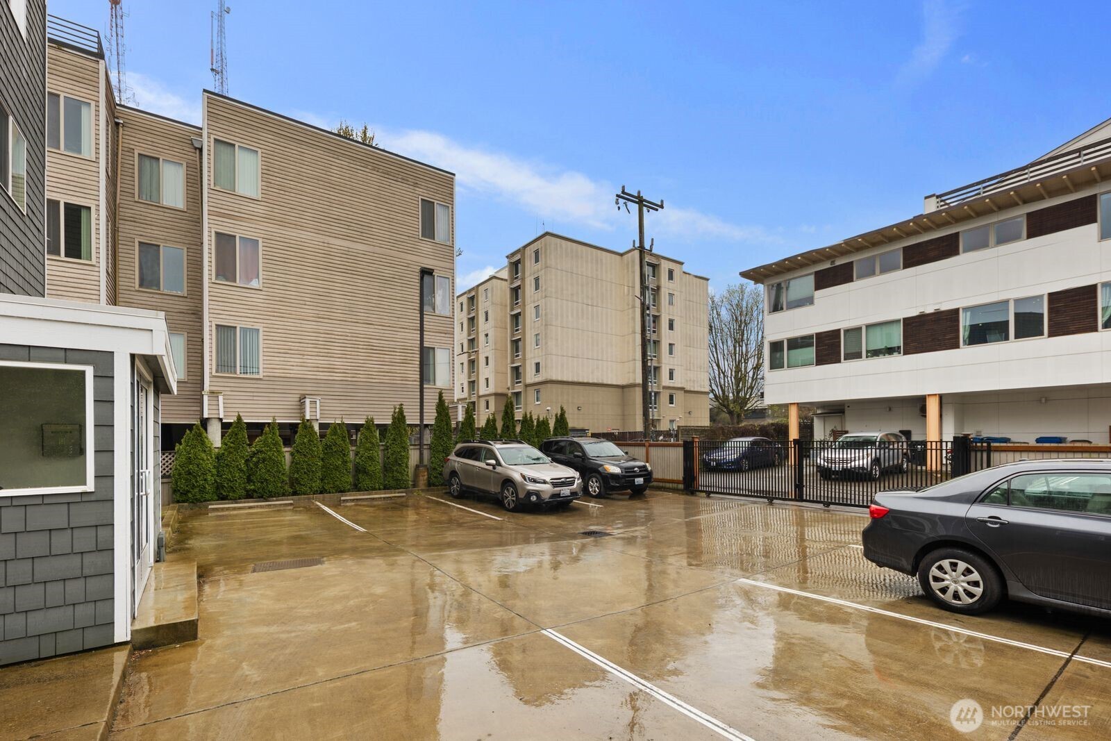 1729 18th Avenue, Unit 201 Seattle, WA 98122 - Photo 30 of 31 a car parked in front of a building