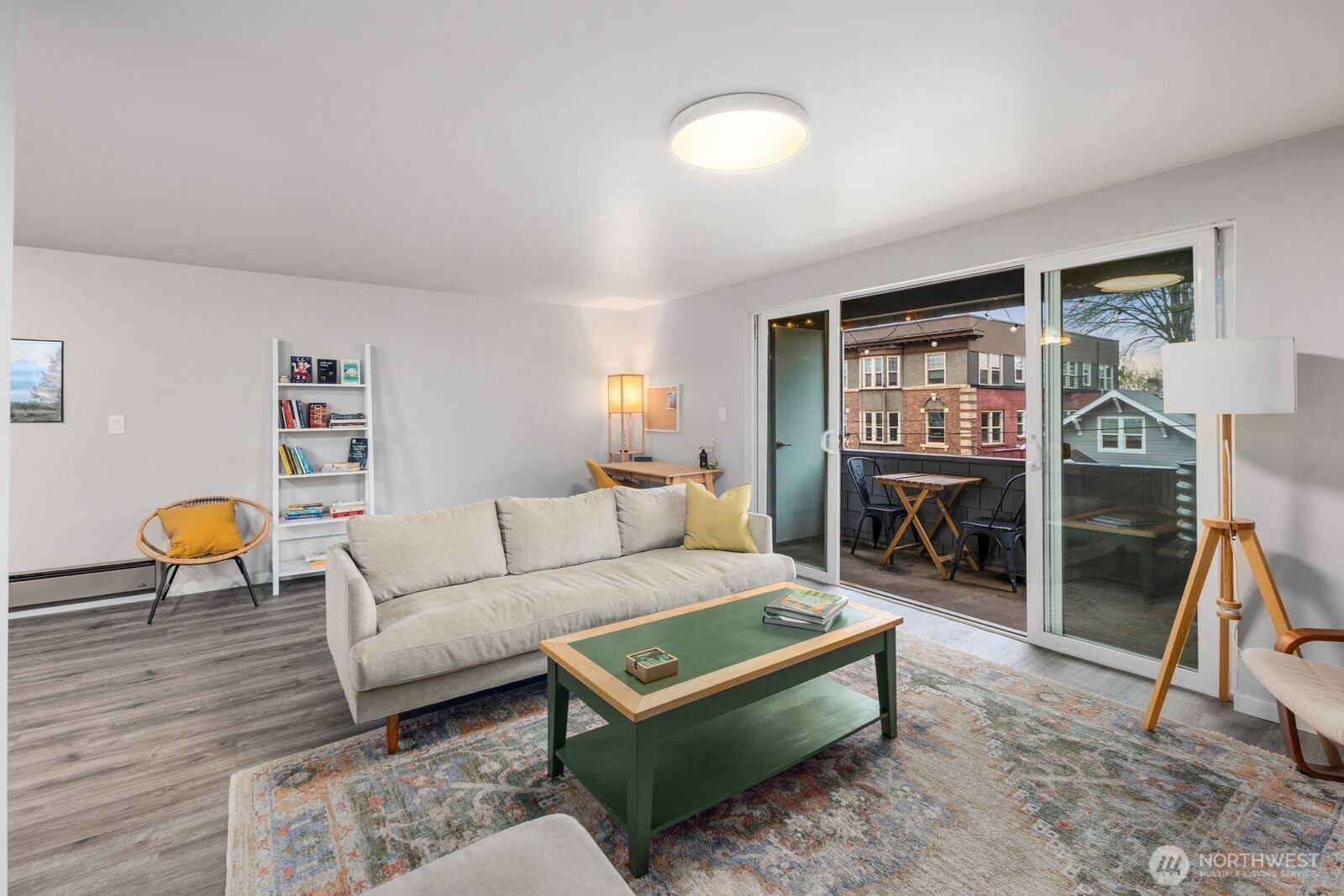 1729 18th Avenue, Unit 201 Seattle, WA 98122 - Photo 7 of 31 a living room with furniture and a rug