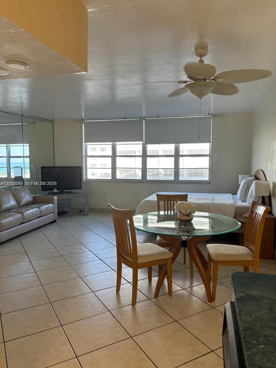 100 Lincoln Road, Unit 731 Miami Beach, FL 33139 - Photo 4 of 14 a view of a dining room with furniture