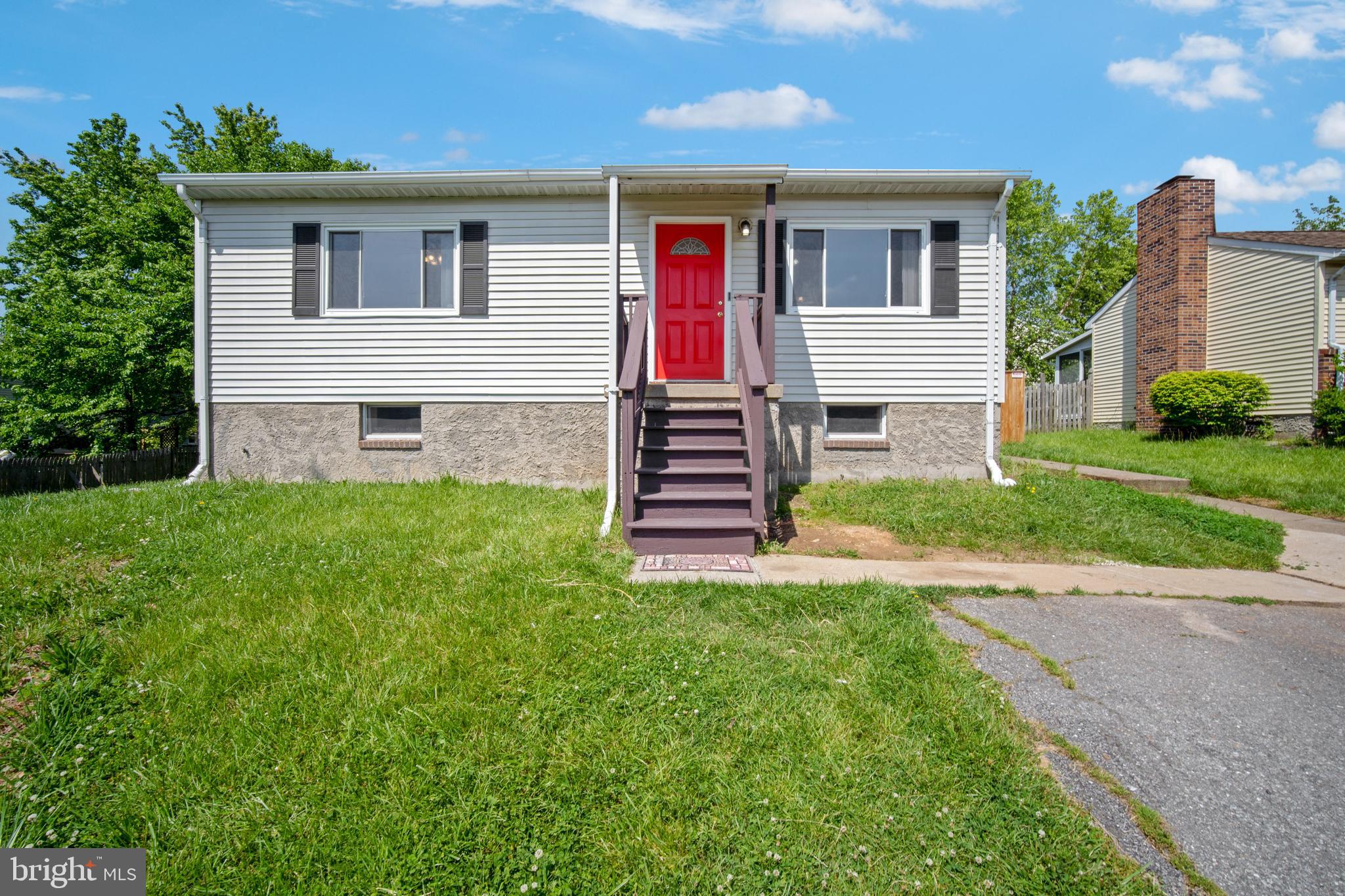 5750 Van Dyke Road Baltimore, MD 21206 - Photo 1 of 42 sloping grassy yard with two car parking pad