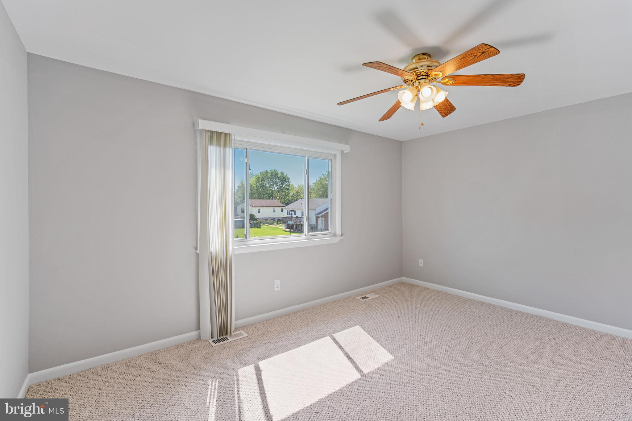 5750 Van Dyke Road Baltimore, MD 21206 - Photo 9 of 42 Bedroom 1 with large window & ceiling fan