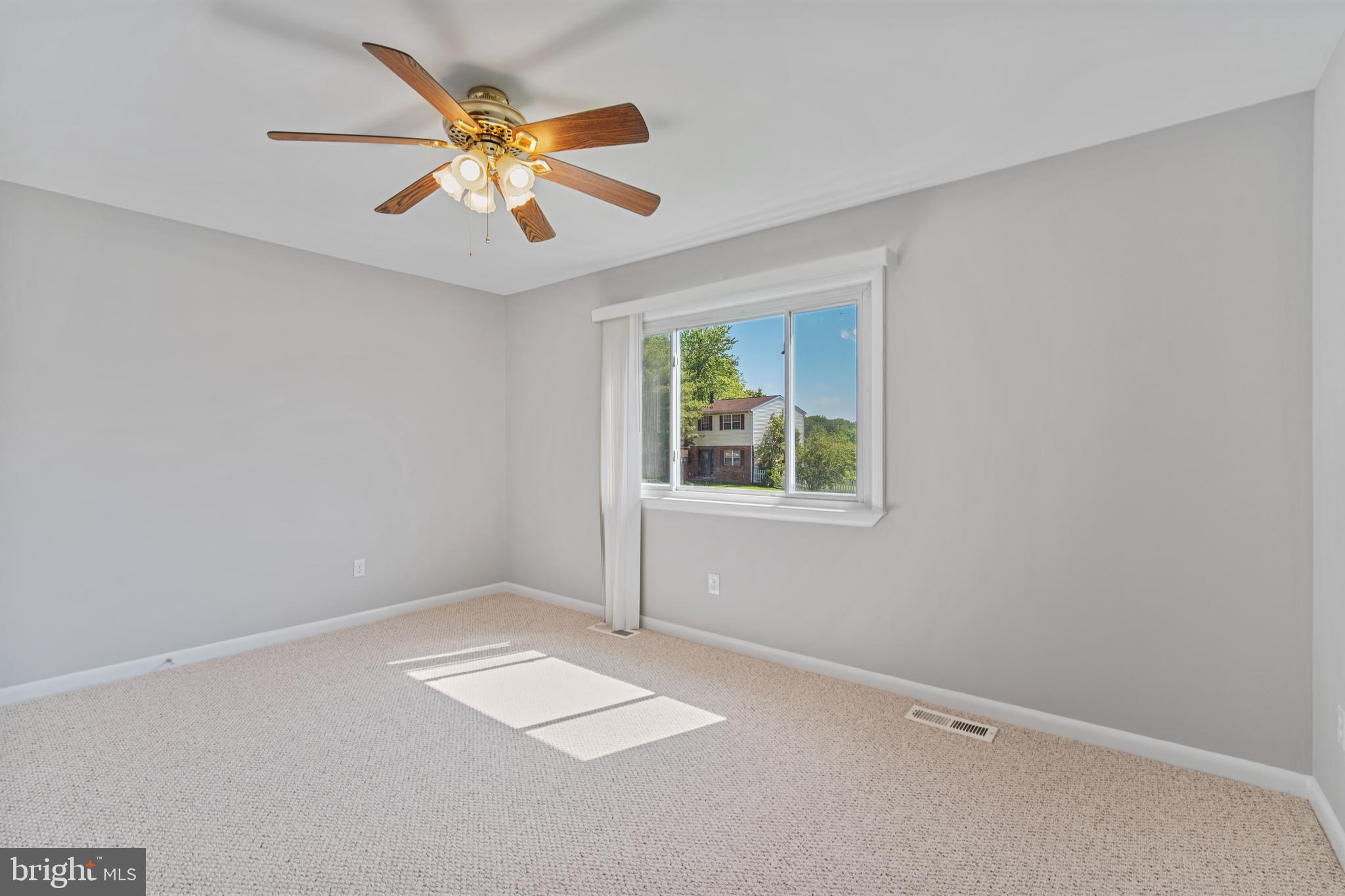 5750 Van Dyke Road Baltimore, MD 21206 - Photo 10 of 42 Bedroom 1 has berber carpet & vertical blinds