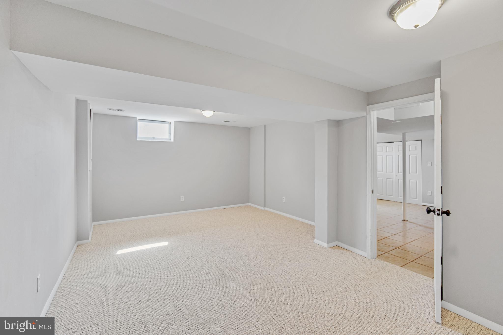 5750 Van Dyke Road Baltimore, MD 21206 - Photo 15 of 42 Large Downstairs Bedroom