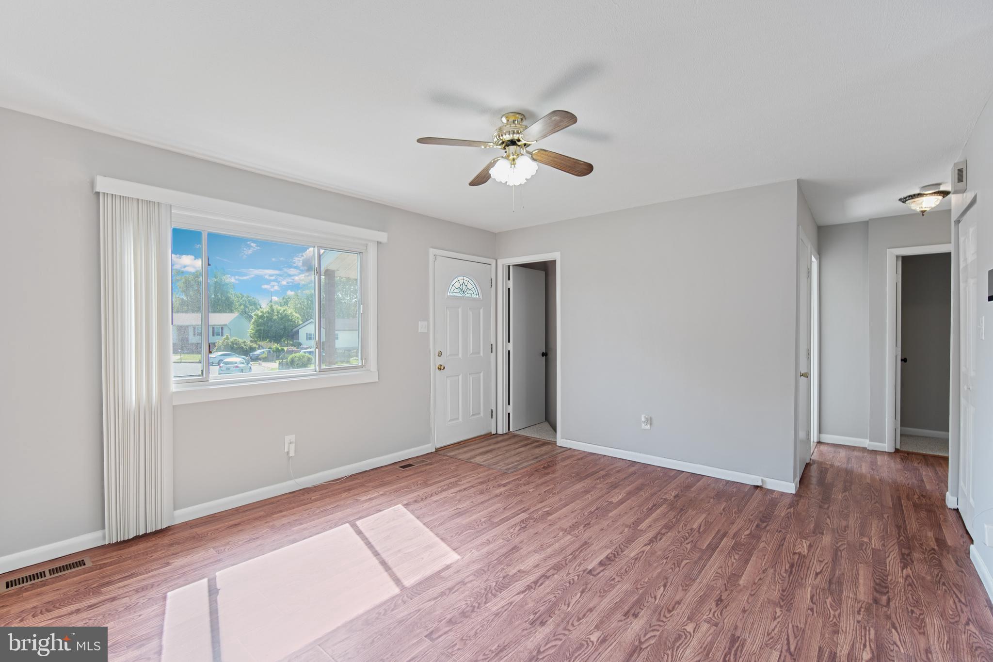 5750 Van Dyke Road Baltimore, MD 21206 - Photo 3 of 42 Living room with large front window, natural light