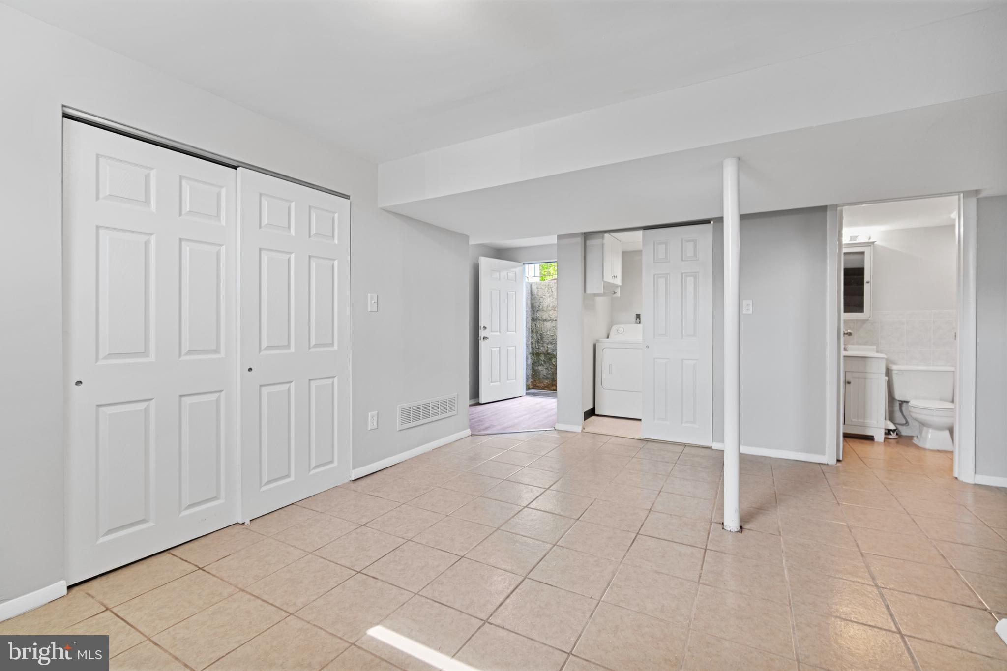 5750 Van Dyke Road Baltimore, MD 21206 - Photo 21 of 42 Downstairs: Utility closet, Laundry, Bathroom