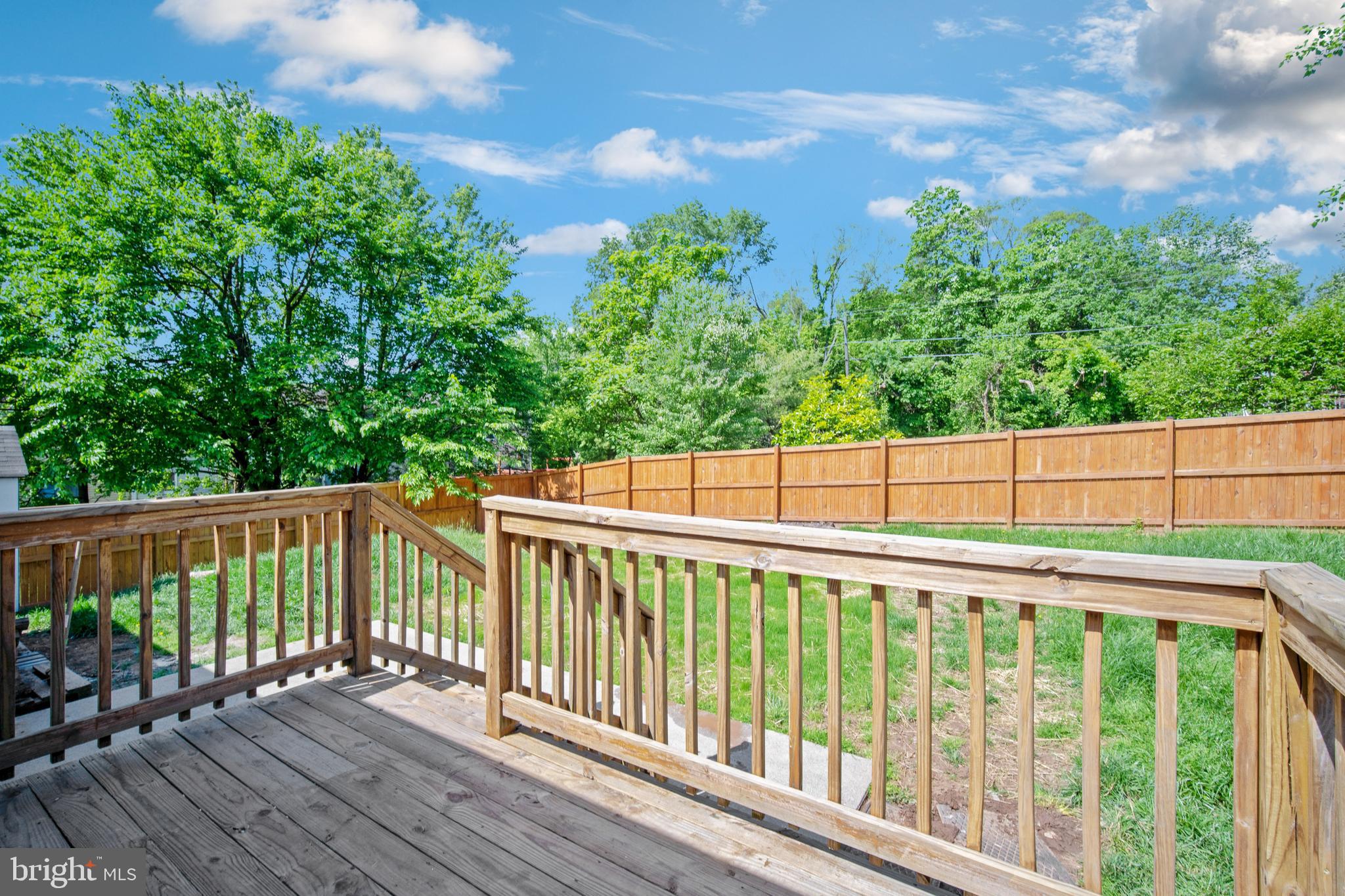 5750 Van Dyke Road Baltimore, MD 21206 - Photo 27 of 42 Back deck to patio and back yard