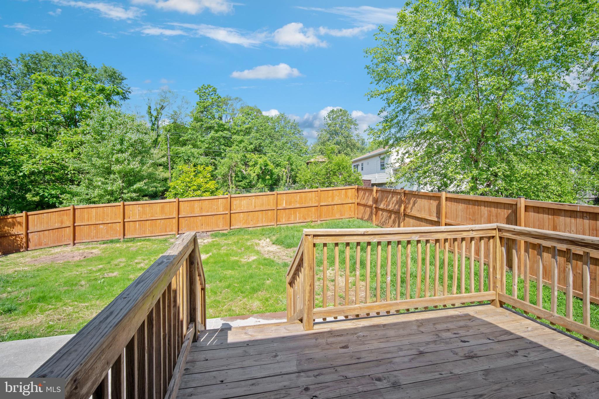 5750 Van Dyke Road Baltimore, MD 21206 - Photo 39 of 42 Back yard deck has room for table and chairs