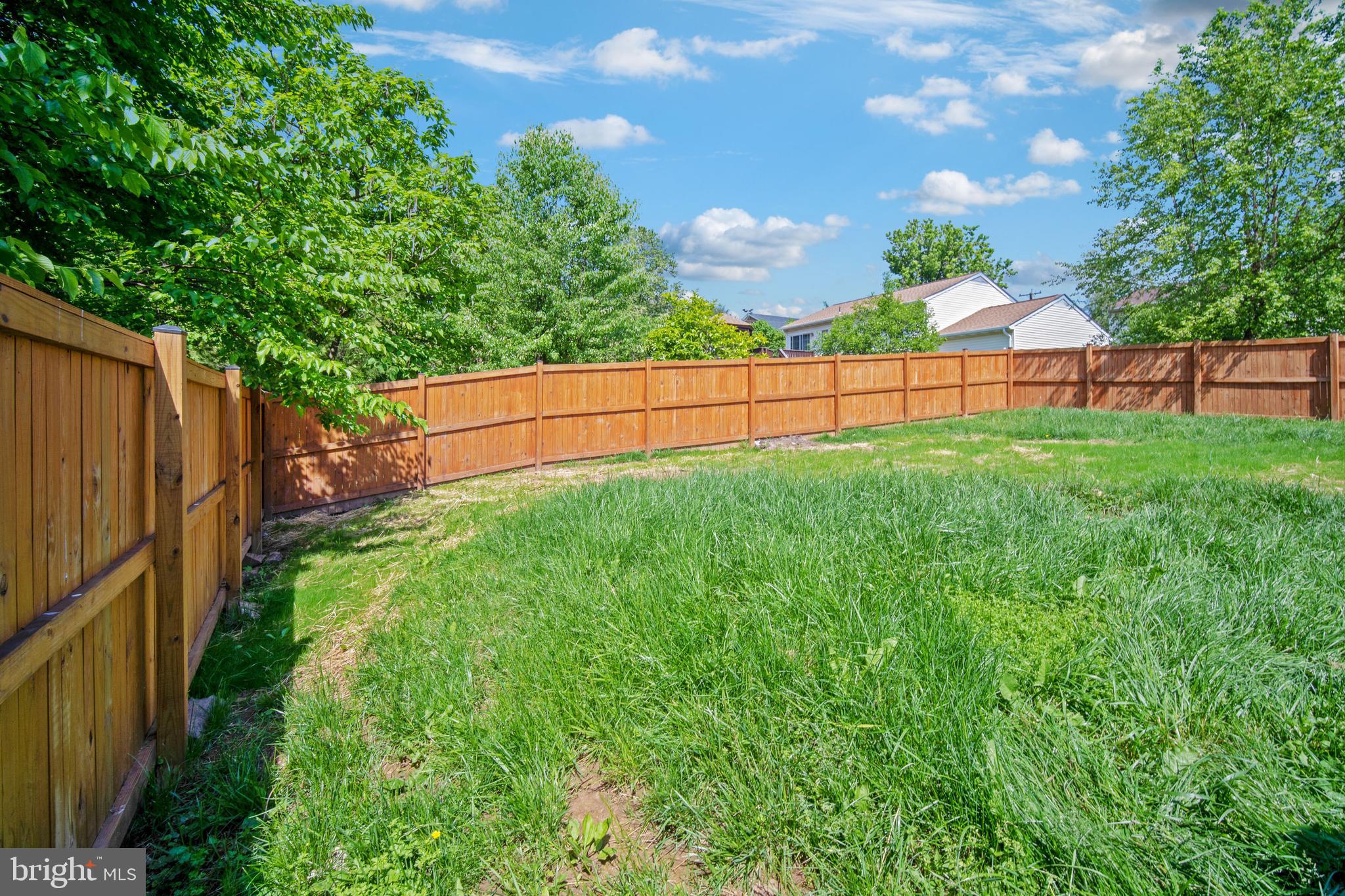 5750 Van Dyke Road Baltimore, MD 21206 - Photo 40 of 42 New privacy fence encloses large back yard.