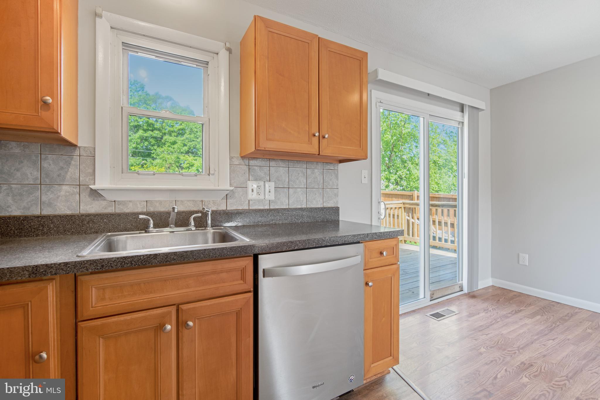5750 Van Dyke Road Baltimore, MD 21206 - Photo 6 of 42 Kitchen overlooks large back yard & rear deck