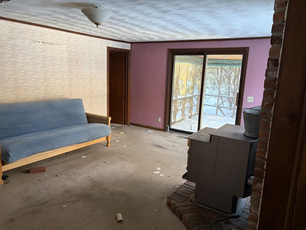 11 South Chesterfield Road Goshen, MA 01096 - Photo 12 of 30 a living room with furniture and a window