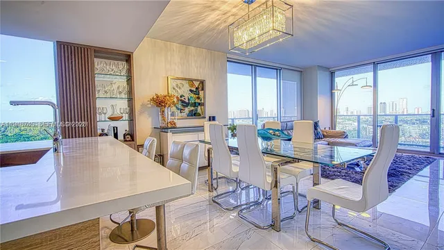 a view of a dining room with furniture window and outside view