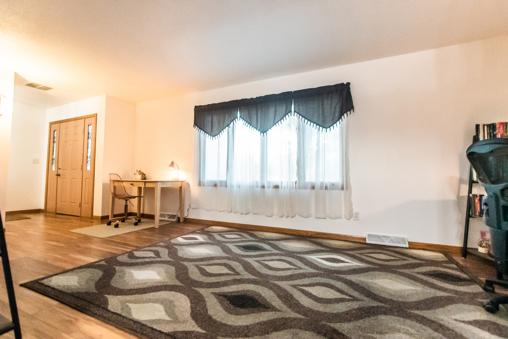 2235 Center Lane Dixon, IL 61021 - Photo 17 of 51 a view of a bedroom with wooden floor and windows