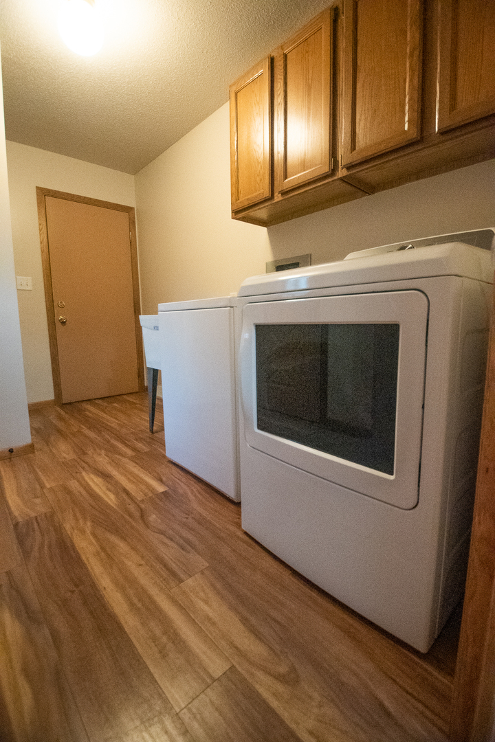 2235 Center Lane Dixon, IL 61021 - Photo 18 of 51 a kitchen with granite countertop wood cabinets and stainless steel appliances