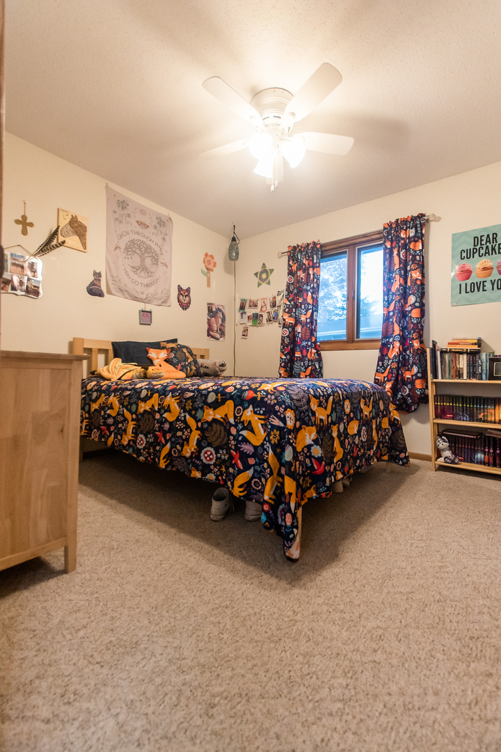 2235 Center Lane Dixon, IL 61021 - Photo 21 of 51 a bed room with a bed and a couch