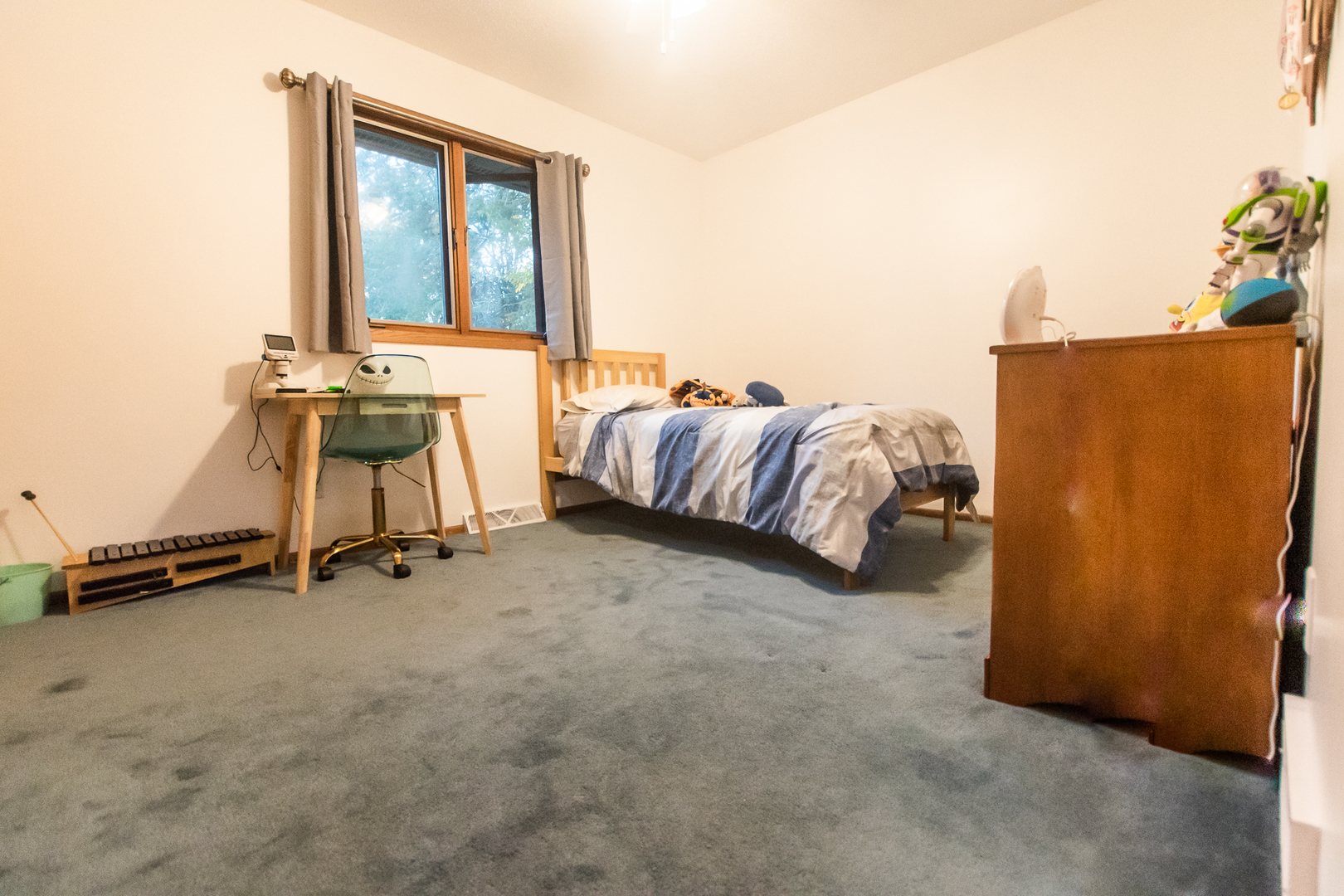 2235 Center Lane Dixon, IL 61021 - Photo 24 of 51 a room with a bed and a chair