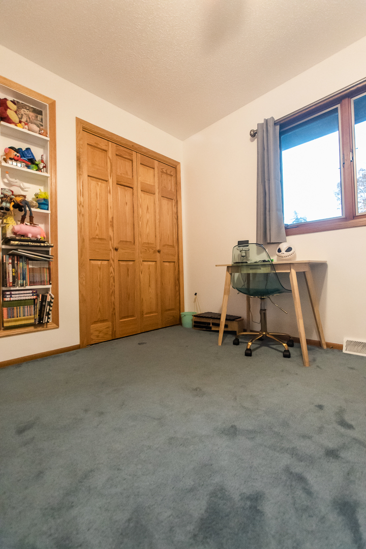 2235 Center Lane Dixon, IL 61021 - Photo 25 of 51 a view of a room with gym equipment and a window